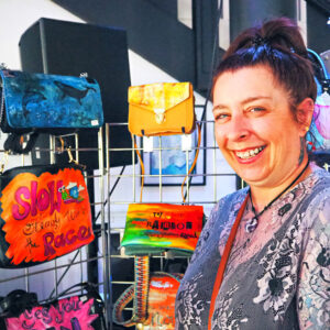 Julia and her hand painted bags